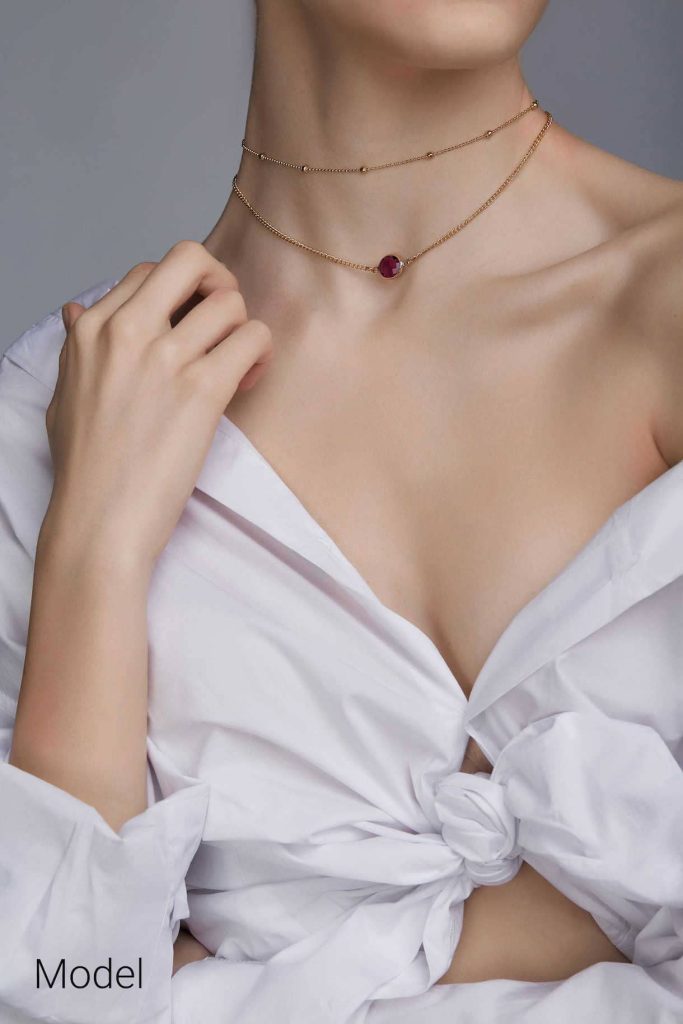 cropped-shot-lady-wearing-white-chest